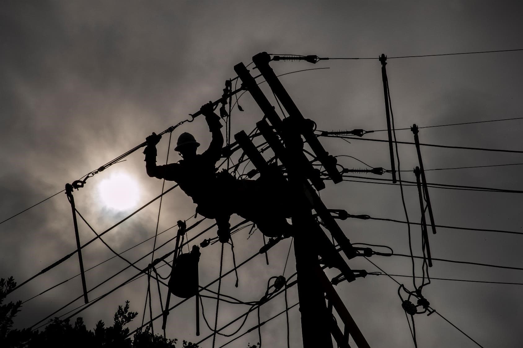 Crew working on lines at dusk