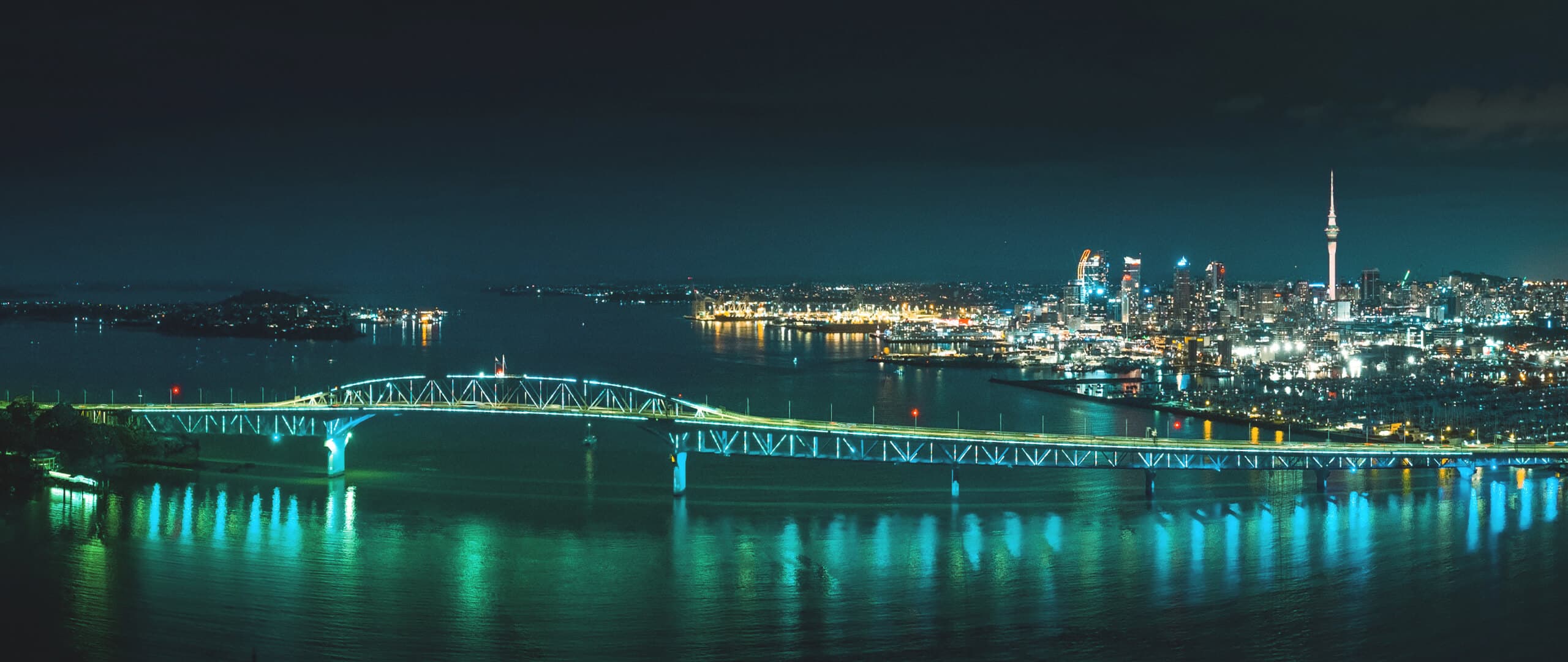 Auckland Harbour Bridge lit up with vector lights