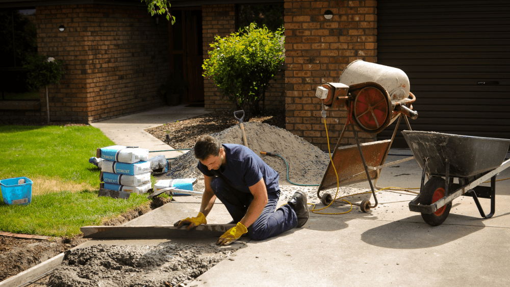 Person working in the garden of a property